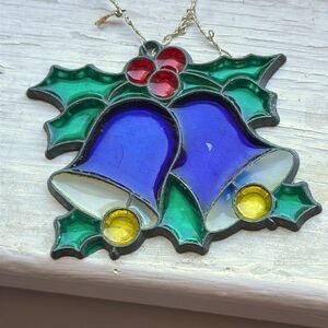 Small stained glass look blue Christmas bells sun catcher or ornament